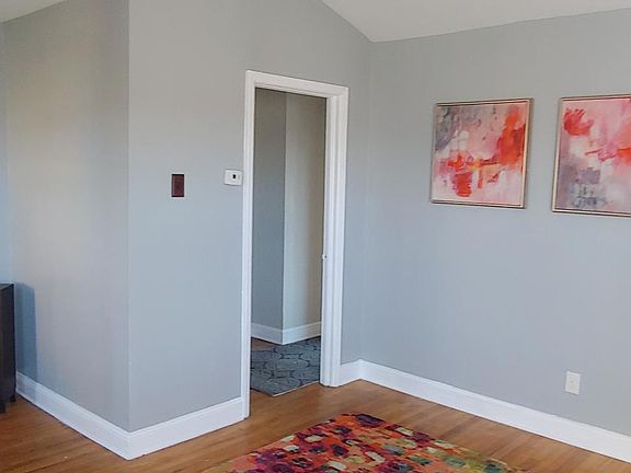 Vaulted ceiling in living room. Fresh paint throughout on all ceilings, walls and exterior