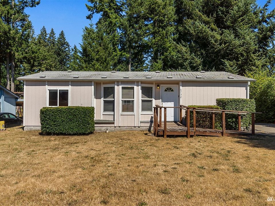 Front of home with accessible entry approach>