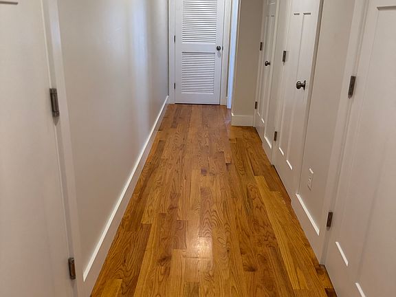 Hallway/ Laundry, closet, 1/2 bath