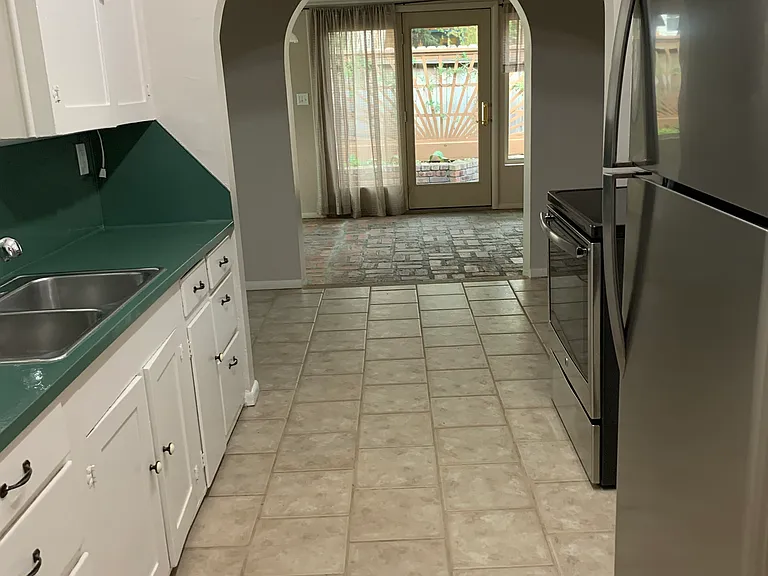 Galley kitchen looking towards back of the house