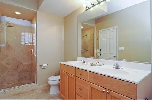 Master Bath with double Sinks, Tub and walk in Shower