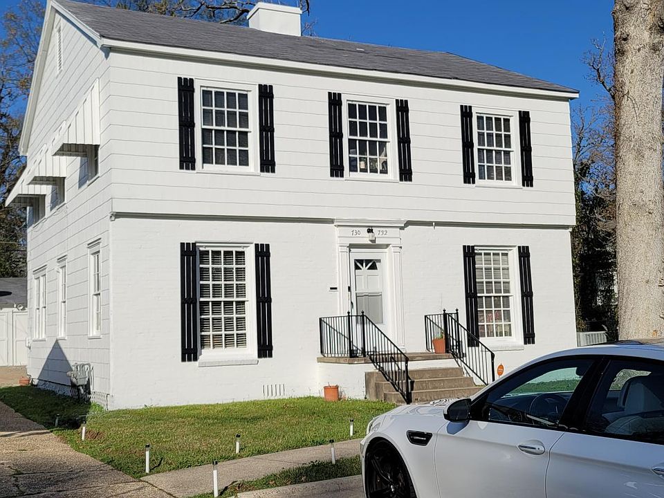 Outside view with onsite parking slab for two cars