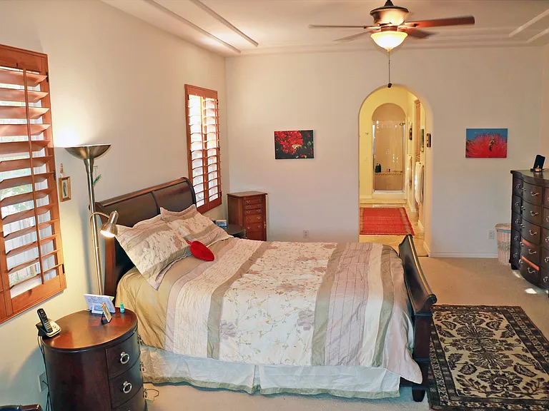 Master Bedroom has Cal King size bed, two night stands, large chest of drawers.