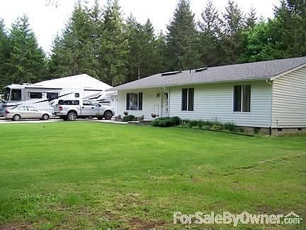 front views
						:
						HOUSE HAS TWO CAR GARAGE , NICE GROOMED YARD