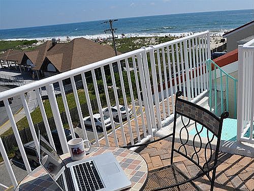 New brick paver rooftop patio with amazing views of the ocean and bay.