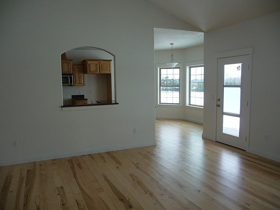 There is a large breakfast nook just off the kitchen which has a built in computer/phone desk. Here 