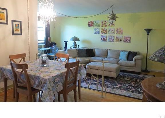Enter a spacious sun-filled apartment.
