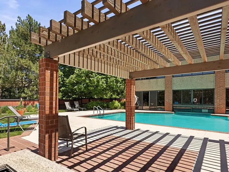 Outdoor pool area with bbq's