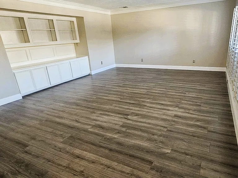 Den downstairs could be a study, a gameroom, a living room. Truly a flexible space. Nice built-in shelves