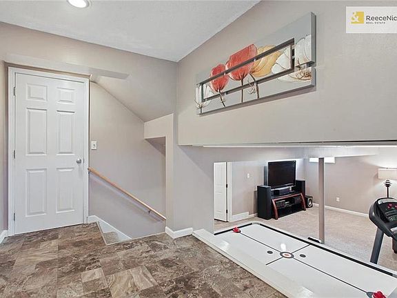 Entryway landing between the main level and the lower level.