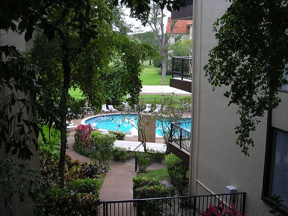 LUSH POOL AREA FOR BUILDING