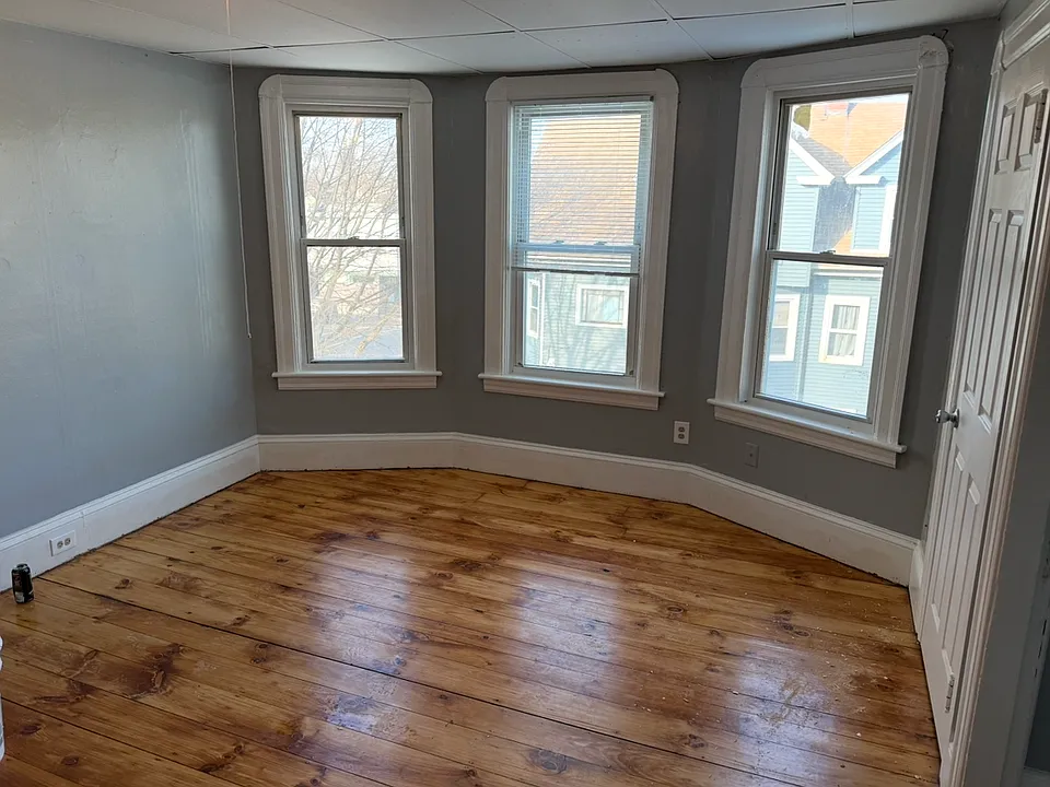 New pictures taken during renovation. Floors have been redone and this is the actual paint color of the apartment now.