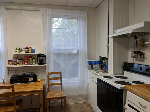 Kitchen space - outside is the covered parking space.