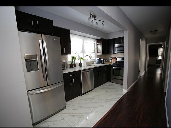 4th image of 6712 Durham Ave