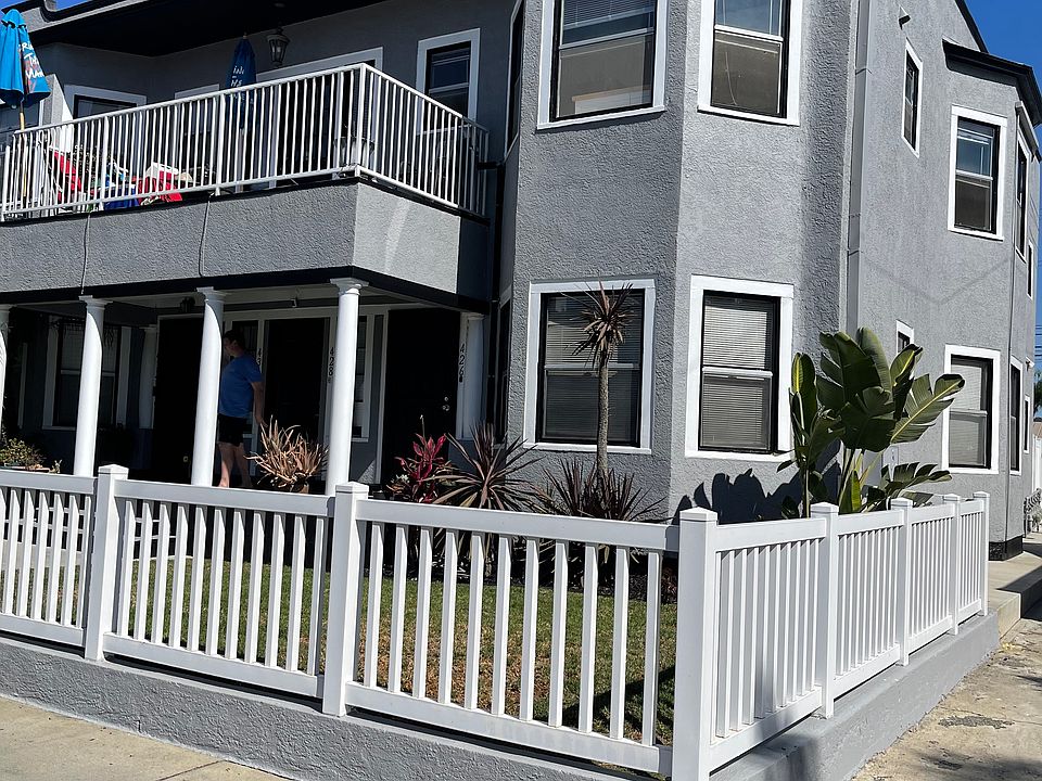 Freshly painted exterior. Shared front yard, fenced (but not secure for very small pets). Front center door is shared entry for upstairs units. Balcony is shared.