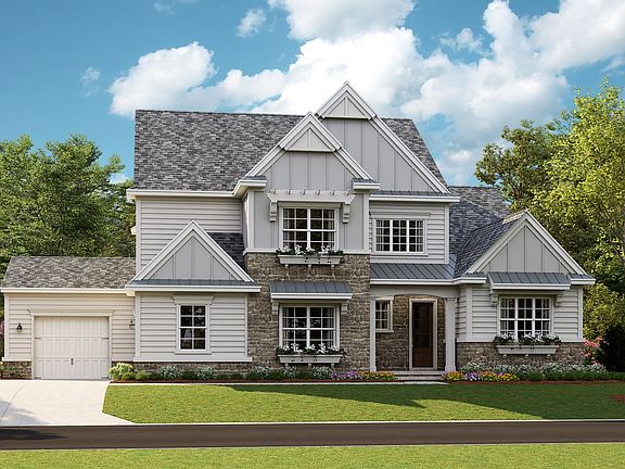 Monterey - American Cottage e 3-Car Side Load Garage Note Renderings may show optional featur