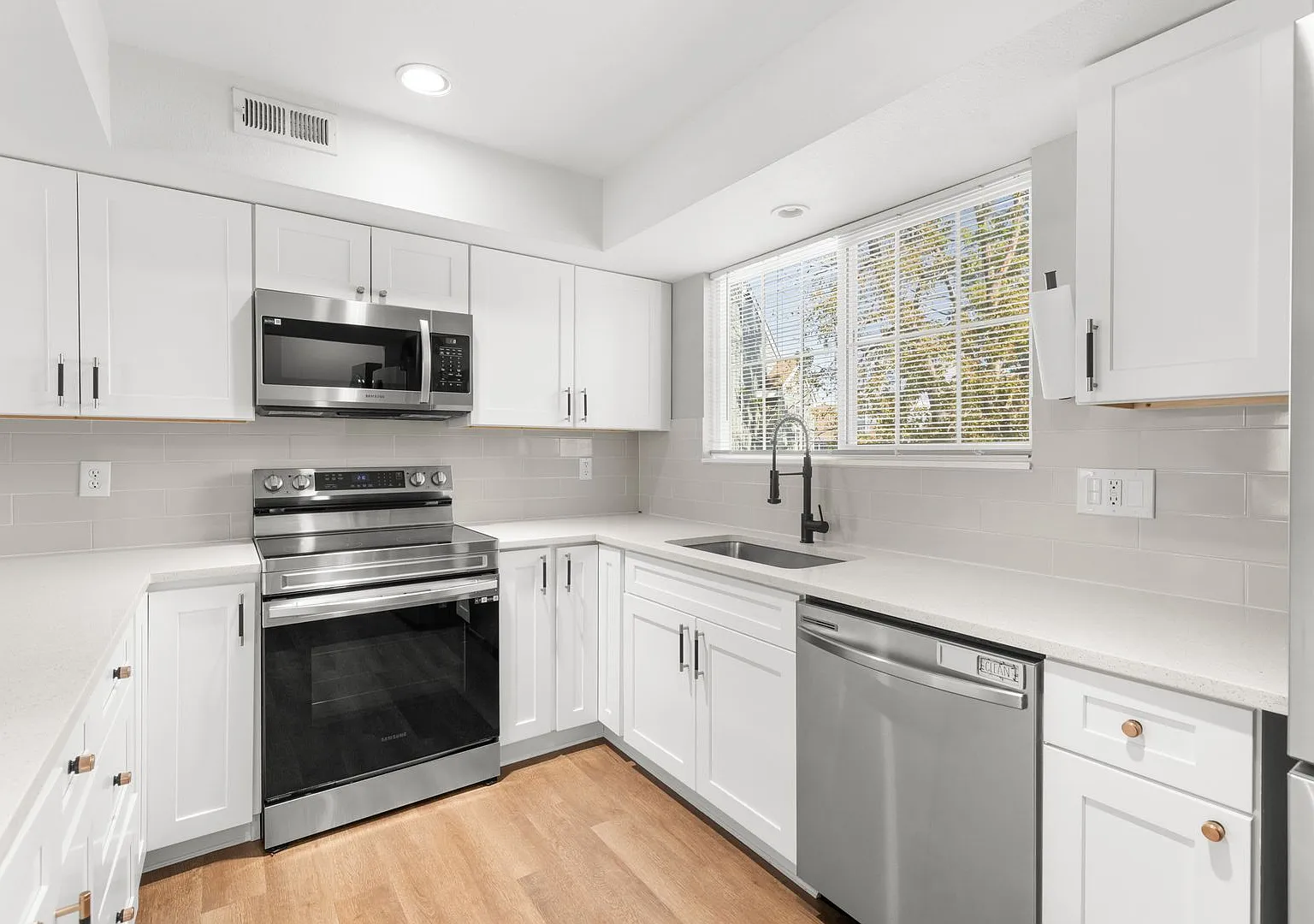 Spacious 4BD/3BA Updated Townhome w/ Private Backyard in Denver, CO- Available NOW! — Photo 1