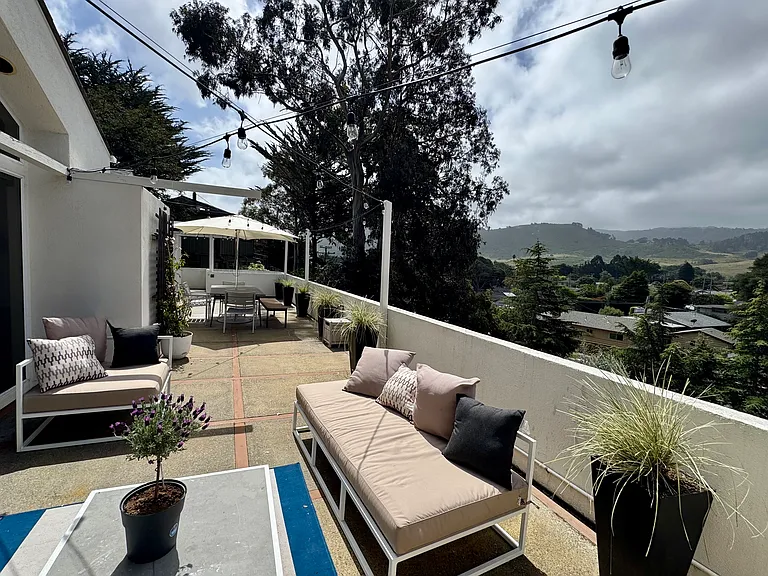 Large second floor balcony with great views.