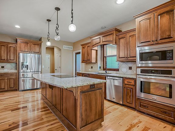 kitchen - 8 ft granite island with induction stovetop
