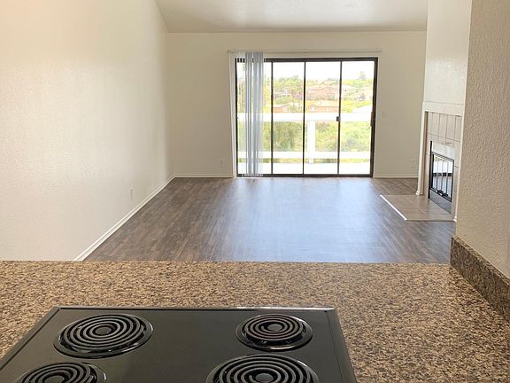Kitchen View into Living Room/ Dining Room
