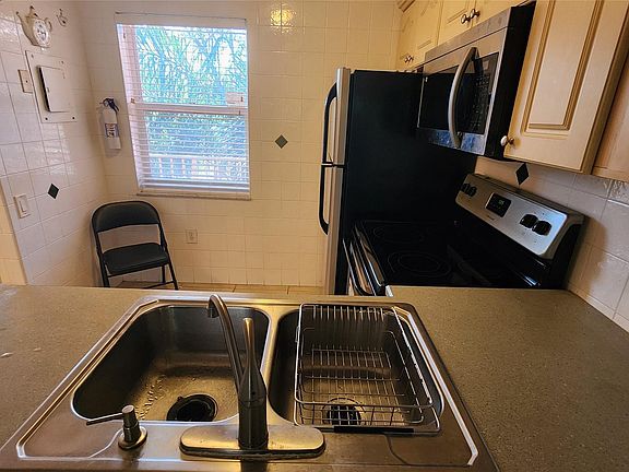 4th image of 9150 Lime Bay Boulevard #314