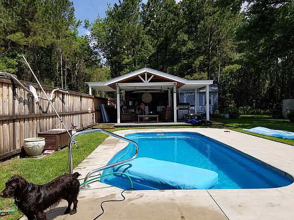 Tiki bar with 55 inch TV.