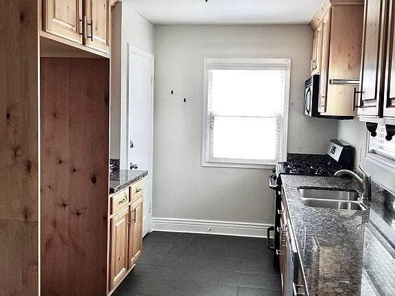 Remolded kitchen with new dishwasher and refrigerator