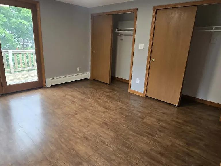 Bedroom with slider to deck