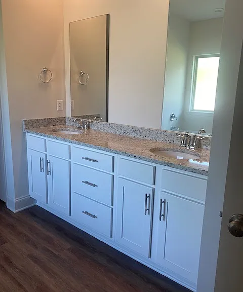 His and Her Sink with Granite counter top, double mirrors