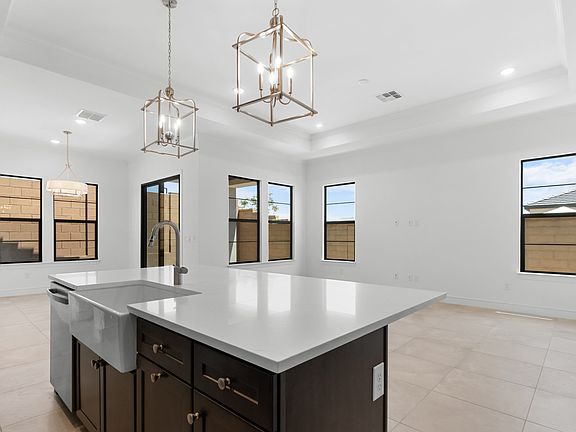 Kitchen with white apron-front sink