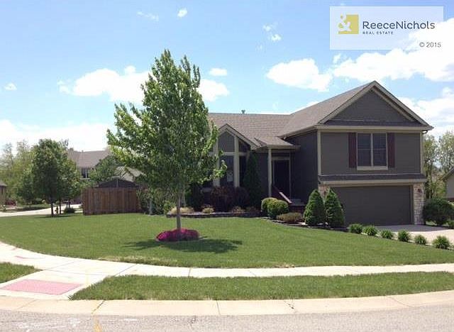 Beautiful landscaping featured on this corner lot in Bristol South