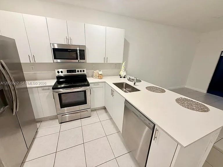 11910 SW 245th Ter #11910 — Photo 13