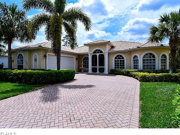 Screened in front door with fountain water display.