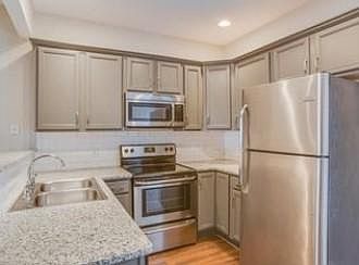 Kitchen with Granite and Stainless Steel Appliances