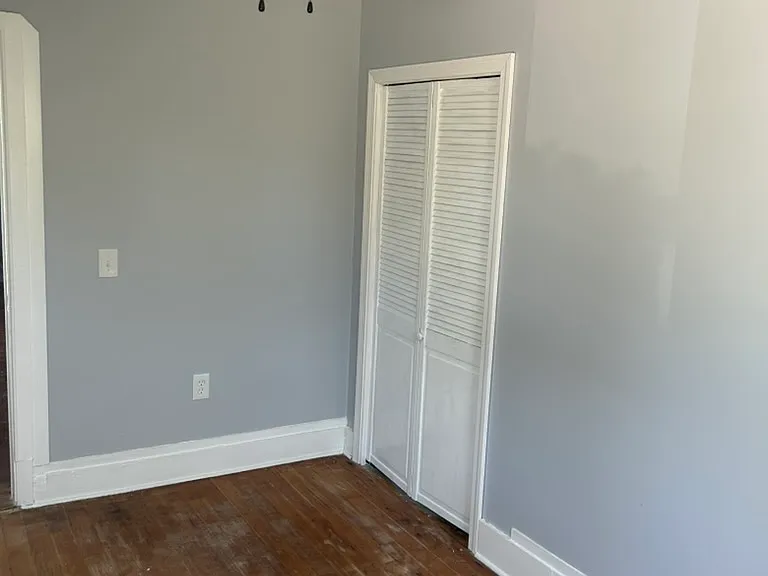 Bedroom #2 with a deep storage closet.