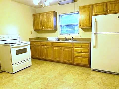 Kitchen - Refrigerator and Stove Provided. No dishwasher.