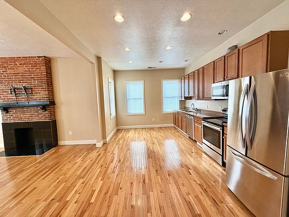 The kitchen comes fully equipped and is open to the great room