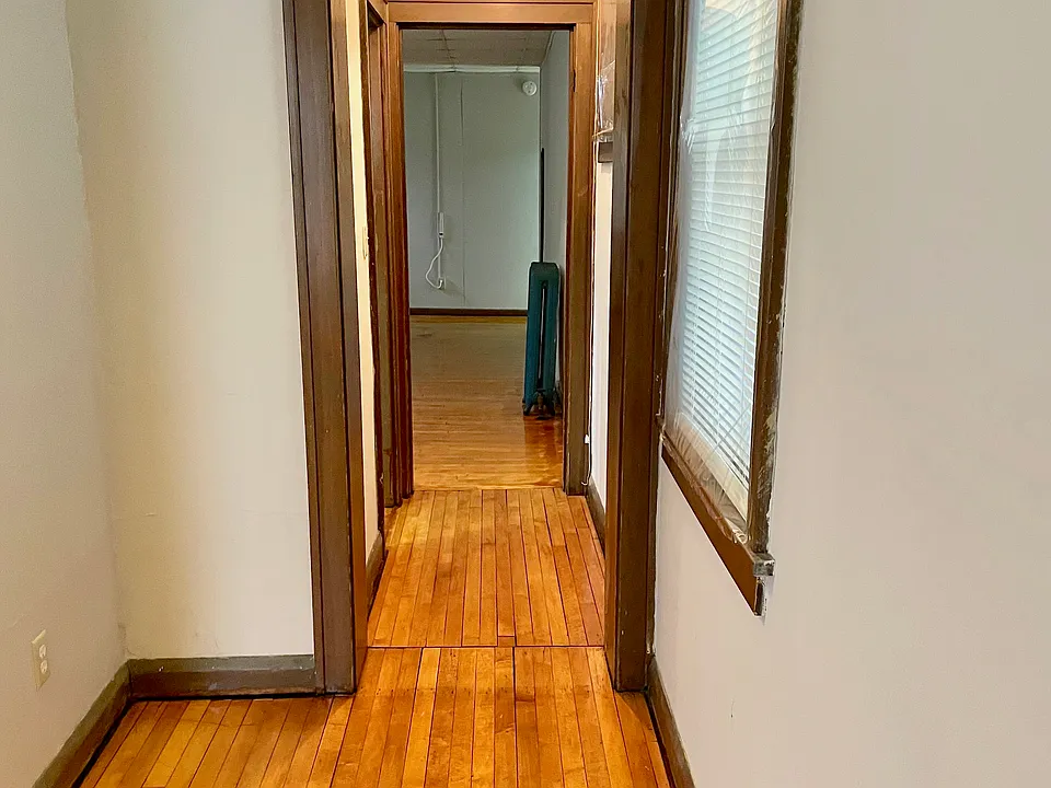 Hallway off Living Room to Bedroom and Walk-in Closet