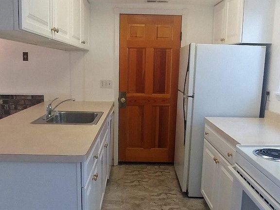 Kitchen with exit to Garage
