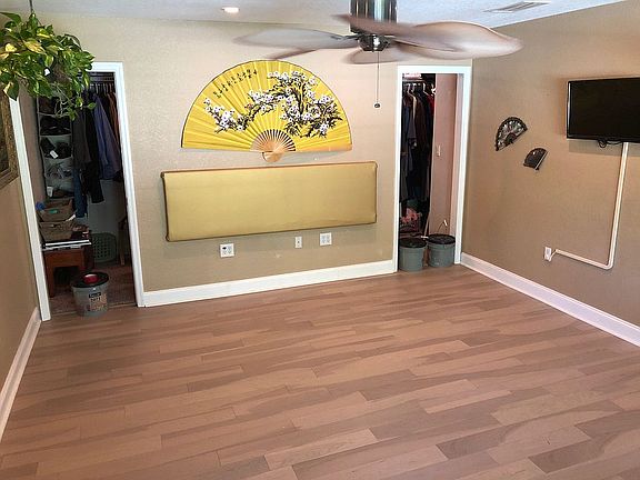 New WOOD floor in master.