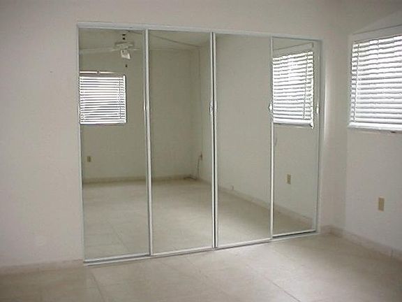 Spacious, mirrored closet.