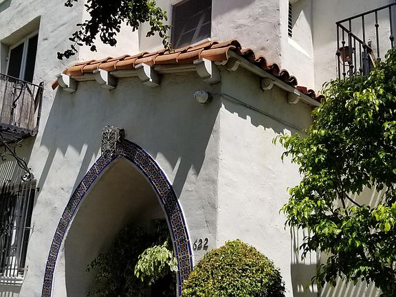 FRONT ENTRANCE TO APARTMENT BUILDING