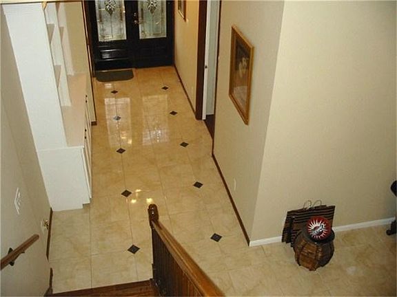 entry with bookshelves