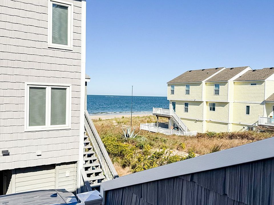 Beach/water views everyday. Enjoy from the main floor balcony and open living room