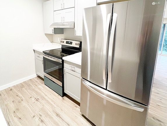 4th image of 4610 Fir Dr NE Unit 1-B