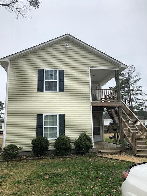 Front of home; upper unit available.