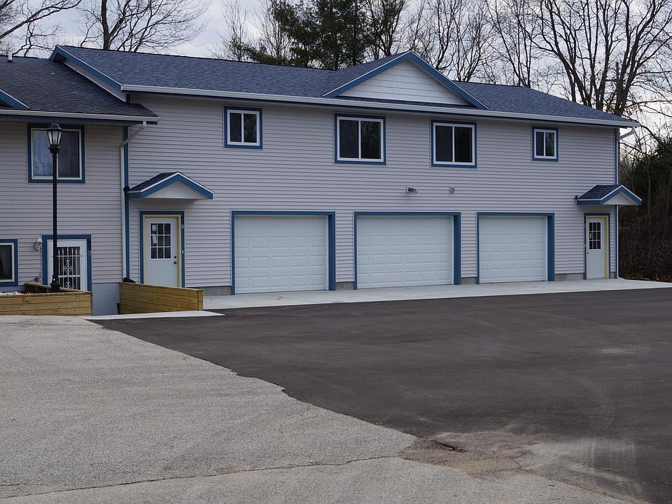 Tucked into the back corner of this small apartment complex is a new addition to Bear Creek Apartments - two beautiful townhouses.