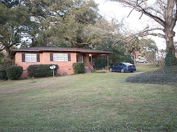 Three-bedroom, 1-bath, brick.