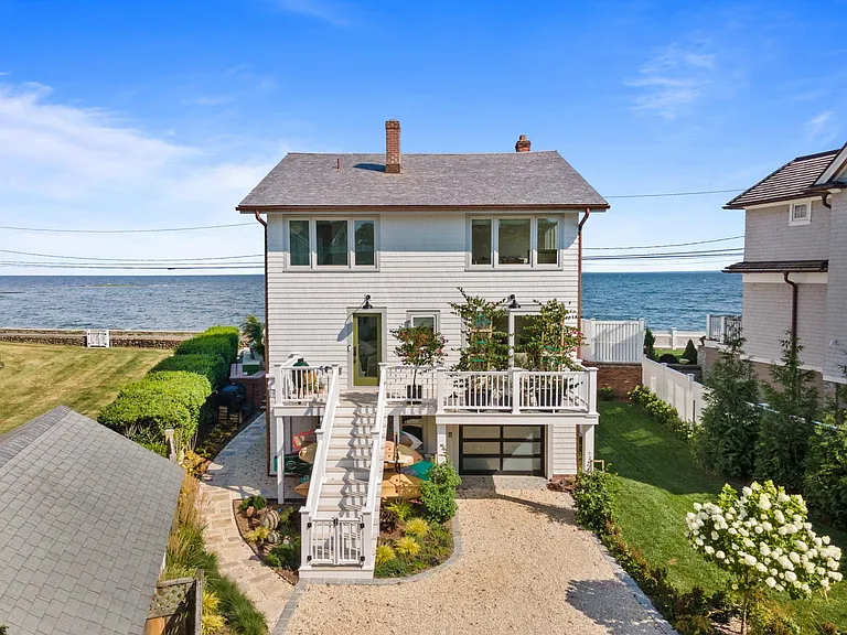 Back of home with plenty of parking which is rare at the beach