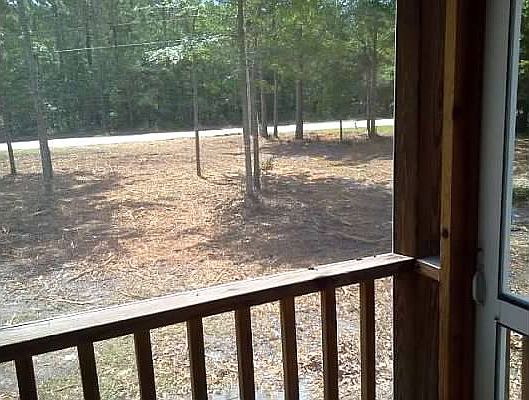 Front porch view - yard/rd 1